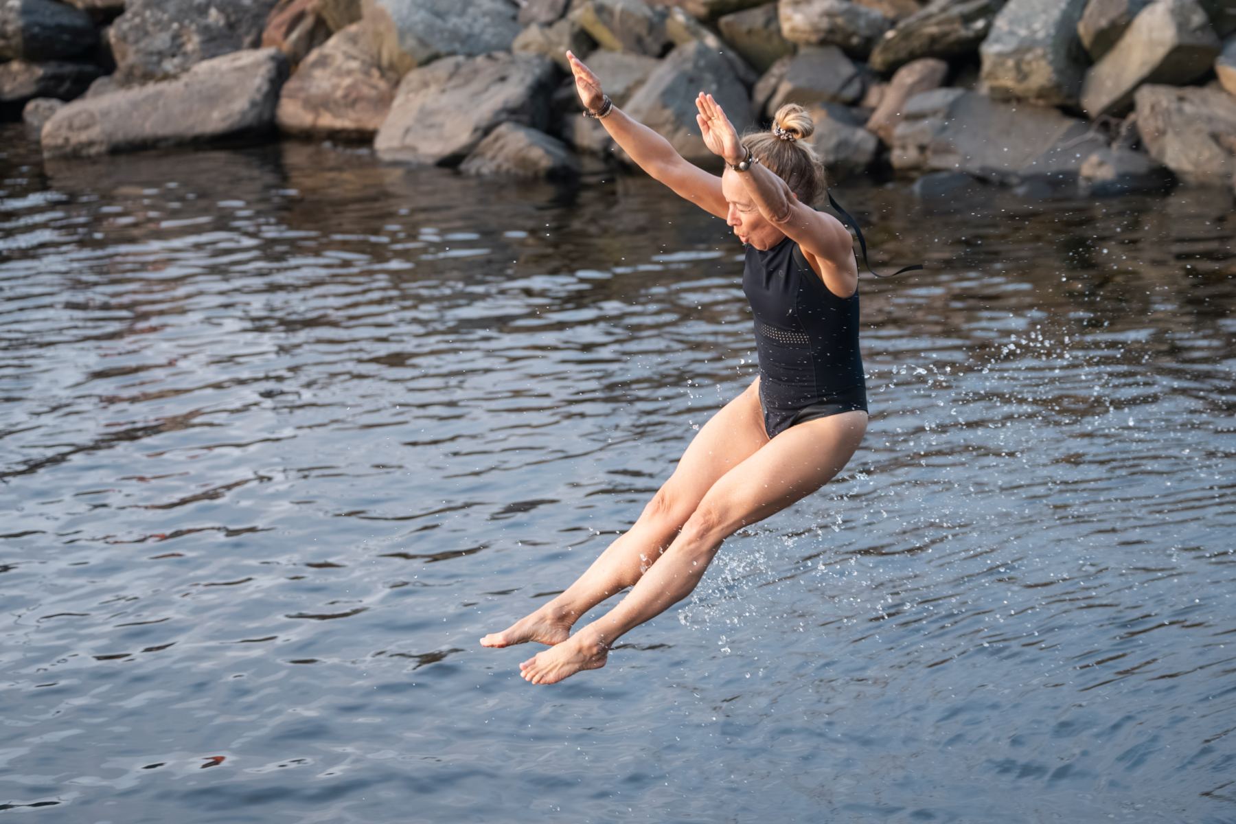 A guest jumping into the loch